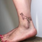 Little fox tattoo on the ankle