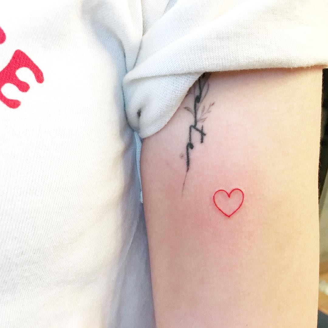 Little red heart tattoo