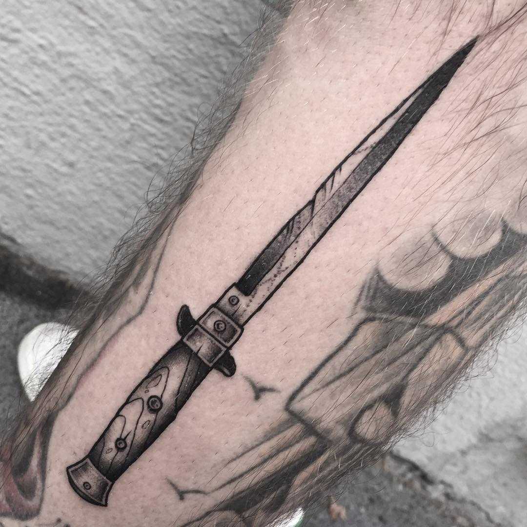 Long dagger tattoo
