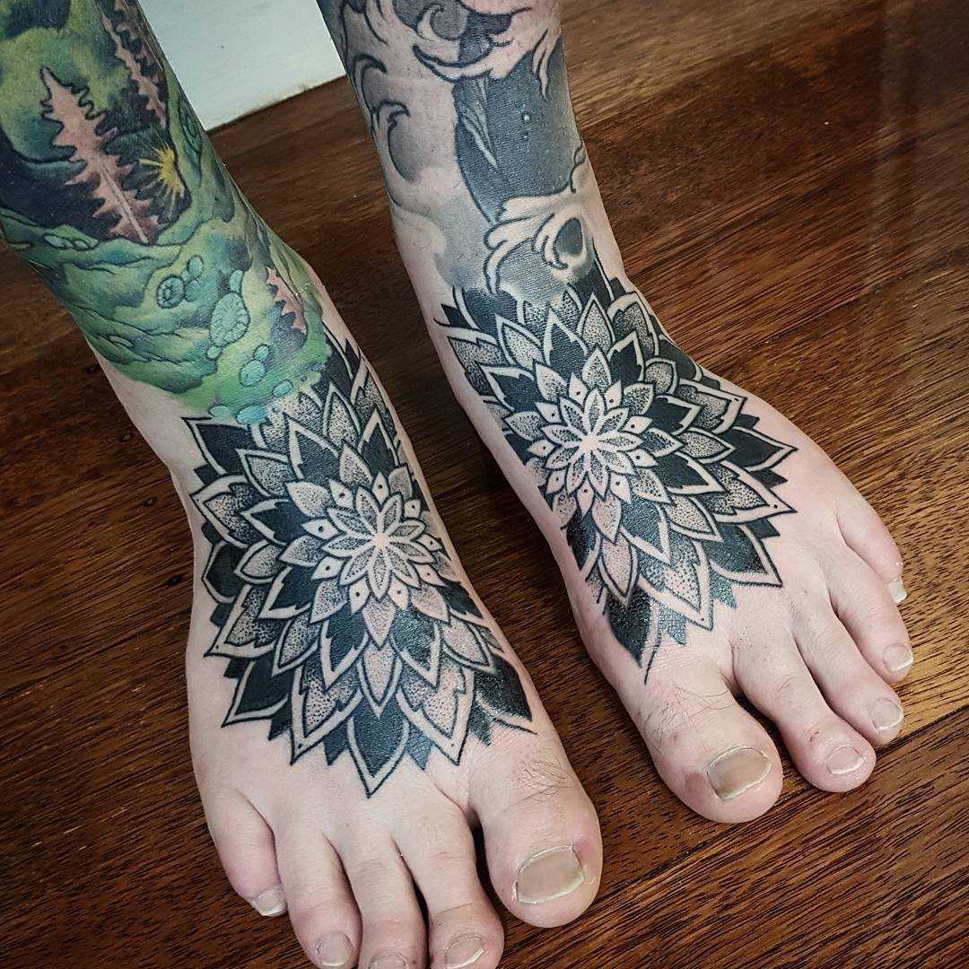 Matching mandala tattoos on feet