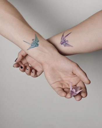 Matching paper crane tattoos