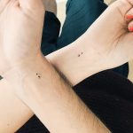 Matching semicolon tattoos
