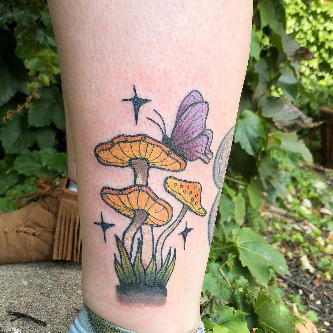 Mushrooms and butterfly tattoo