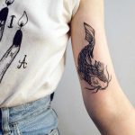Oriental style fish tattoo