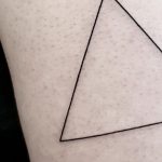 Perfect triangle tattoo done at Mu Body Arts