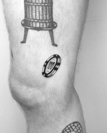 Poker chip tattoo