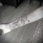 Polygonal world map tattoo