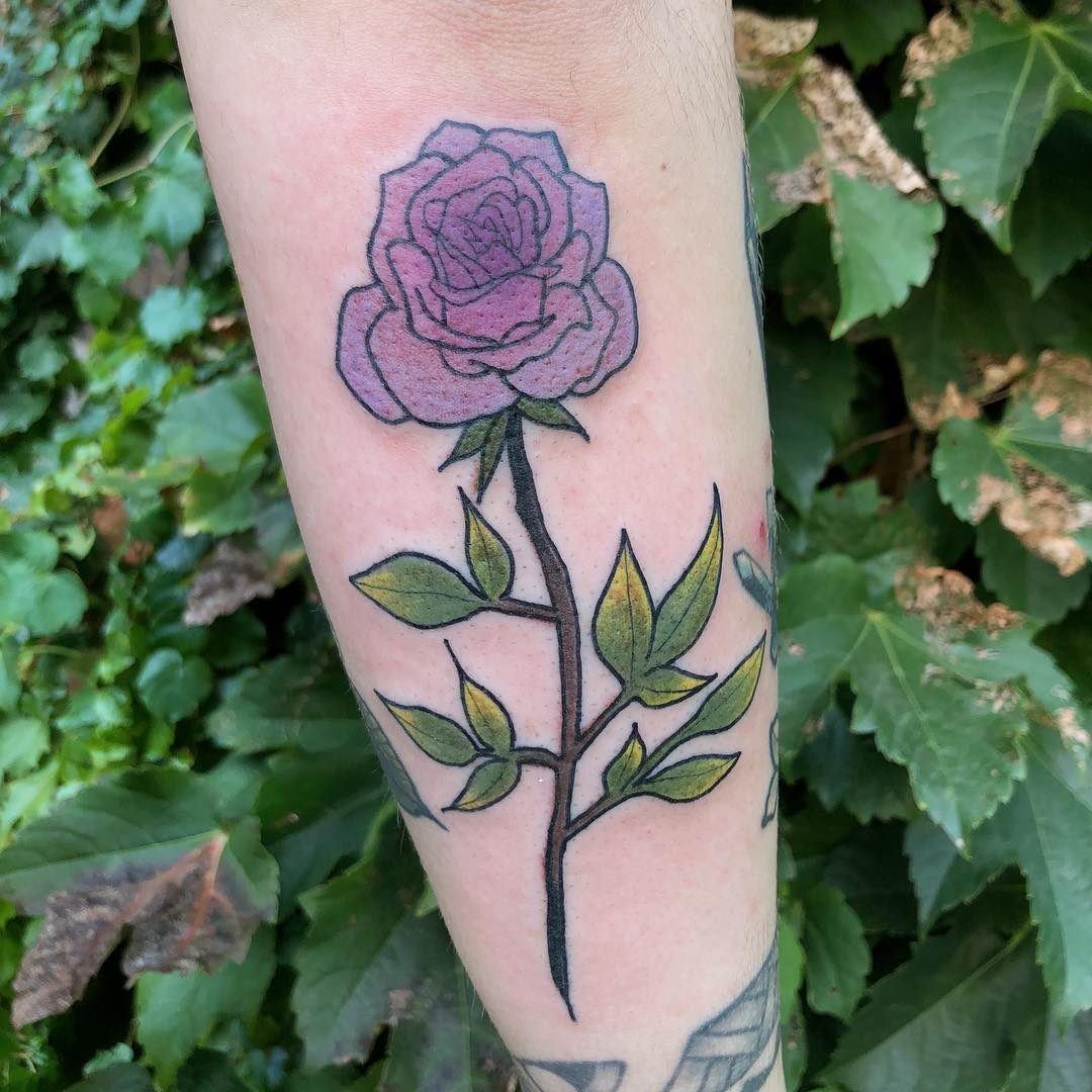 Purple rose tattoo