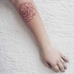 Red rose tattoo by Mina done at Backwards Tattoo