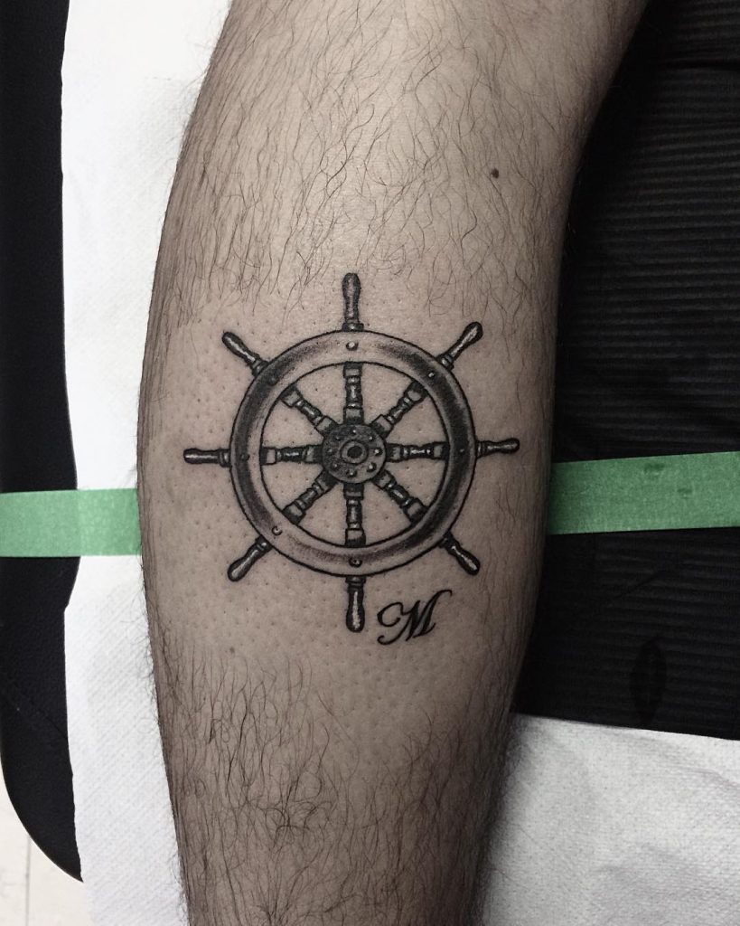 Ship’s wheel tattoo