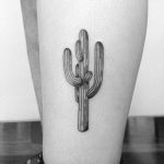 Simple cactus tattoo on the calf