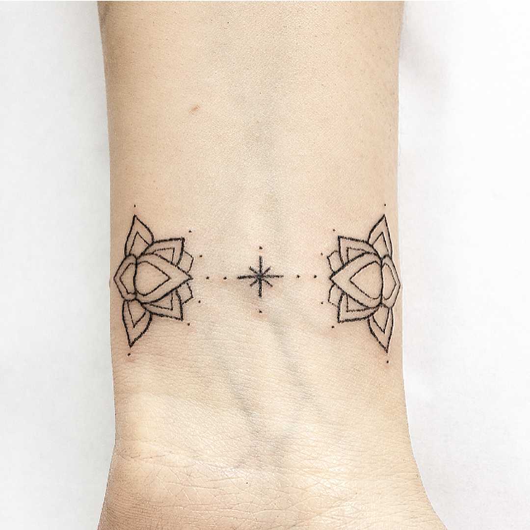 Simple double Lotus bracelet tattoo