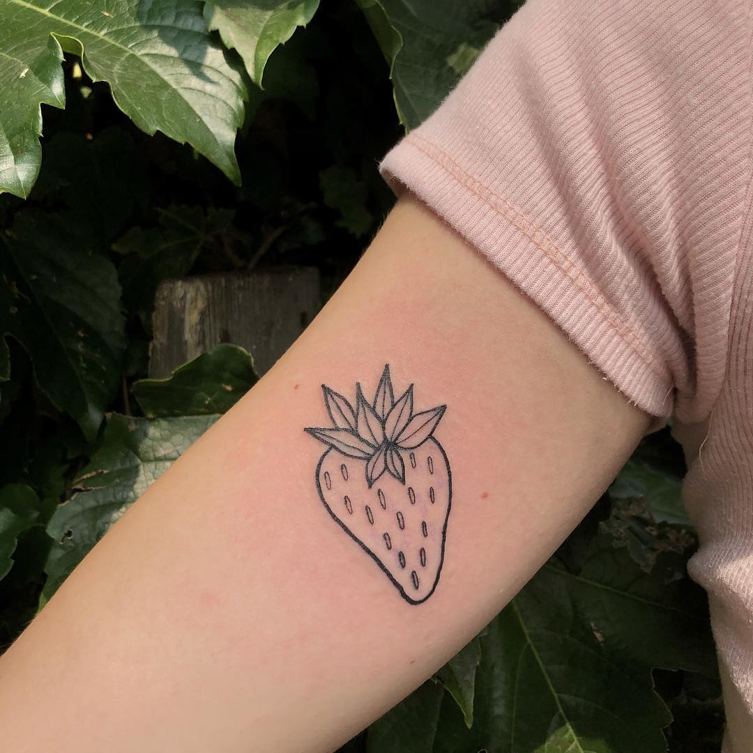 Simple sweetheart strawberry tattoo