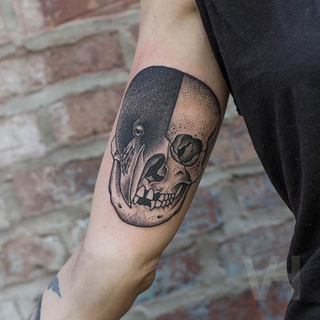 Skull and crow tattoo by Valentin Hirsch 