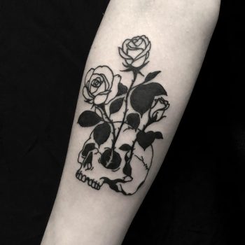 Skull and roses done at BK Ink Studio