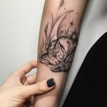 Sleeping fox tattoo by Sasha Tattooing
