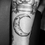 Sleeping moon tattoo
