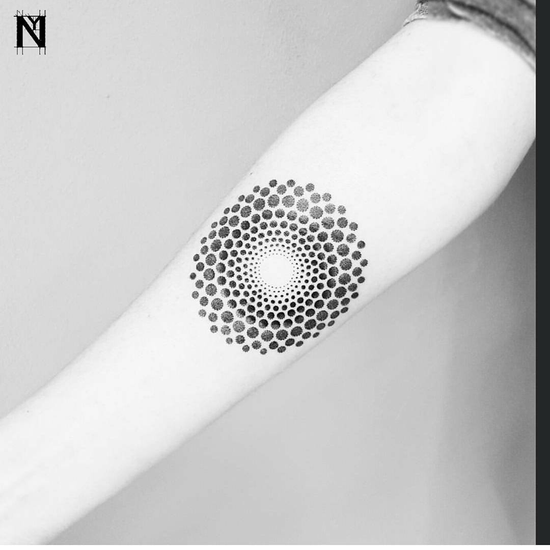 Small dots and circles mandala tattoo