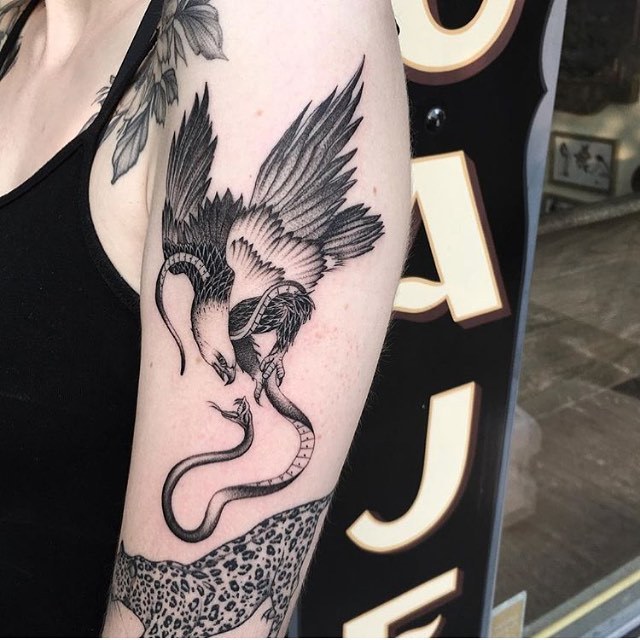 Snake and hawk tattoo by Smick Tattooer