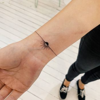 Sun bracelet tattoo