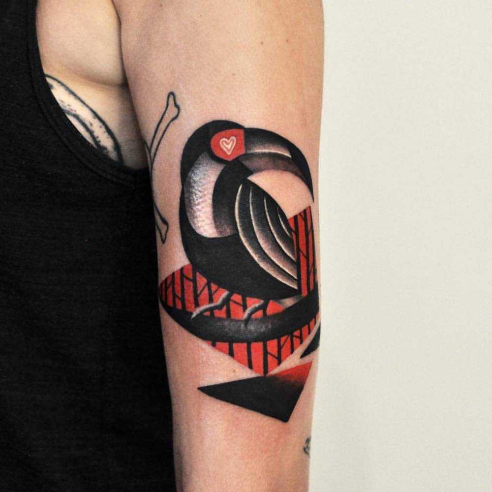 Surrealist toucan tattoo