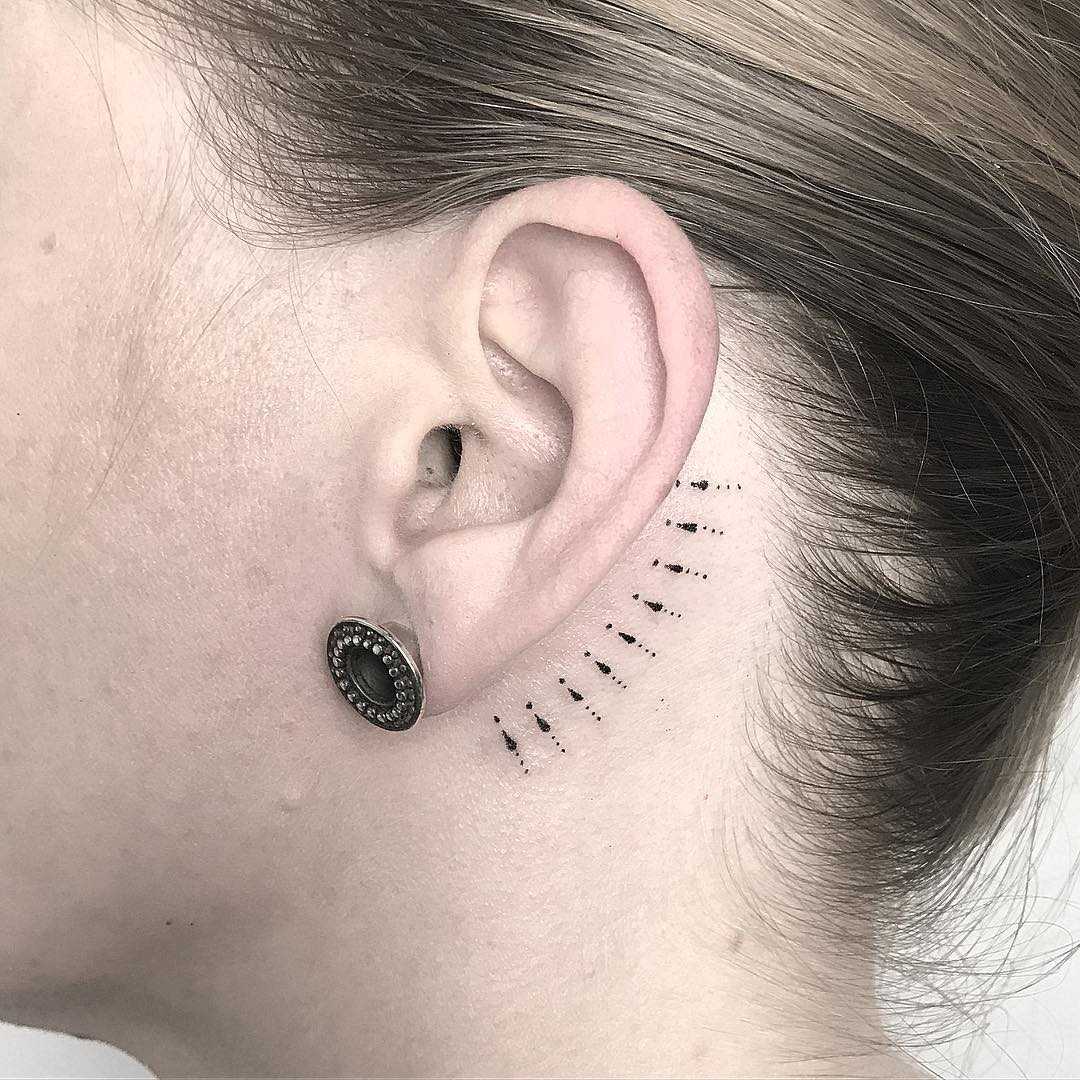Tattoo behind the ear by Femme Fatale