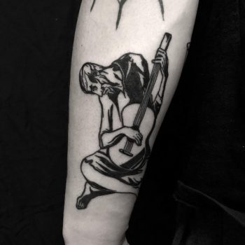 The old guitarist tattoo done at BK Ink Studio