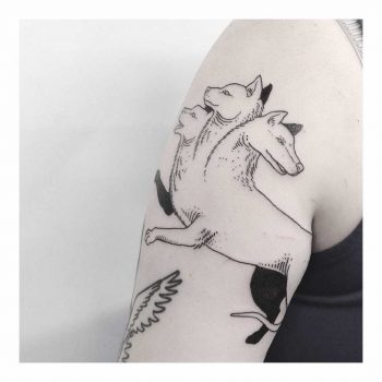 Three-headed dog tattoo