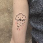 Thunder cloud tattoo on the arm