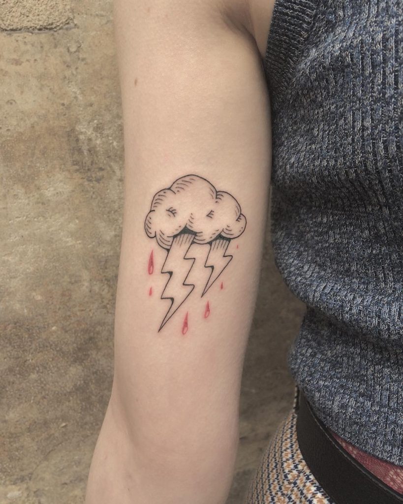Thunder cloud tattoo on the arm 