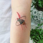 Tiny cute rocket tattoo