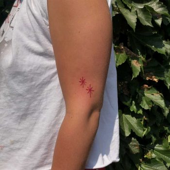 Two red stars tattoo