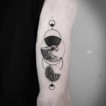 Wave and circles tattoo