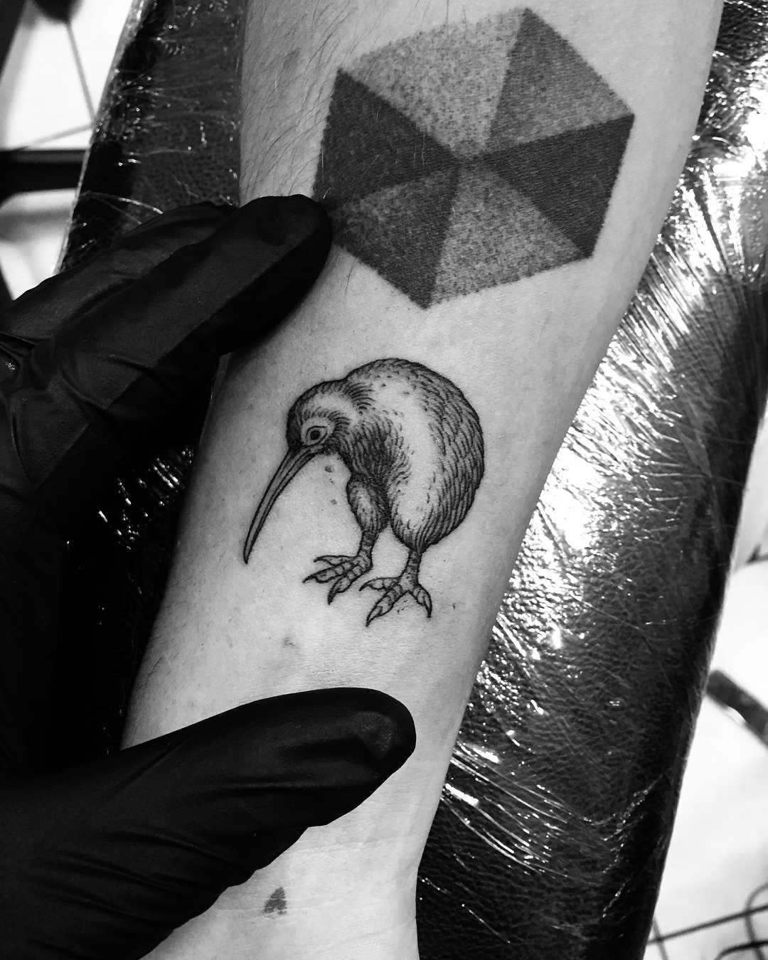 Woodcut kiwi tattoo done at Primordial Pain