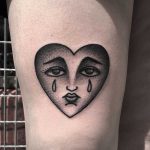 American traditional hear tattoo by Mark Jelliman
