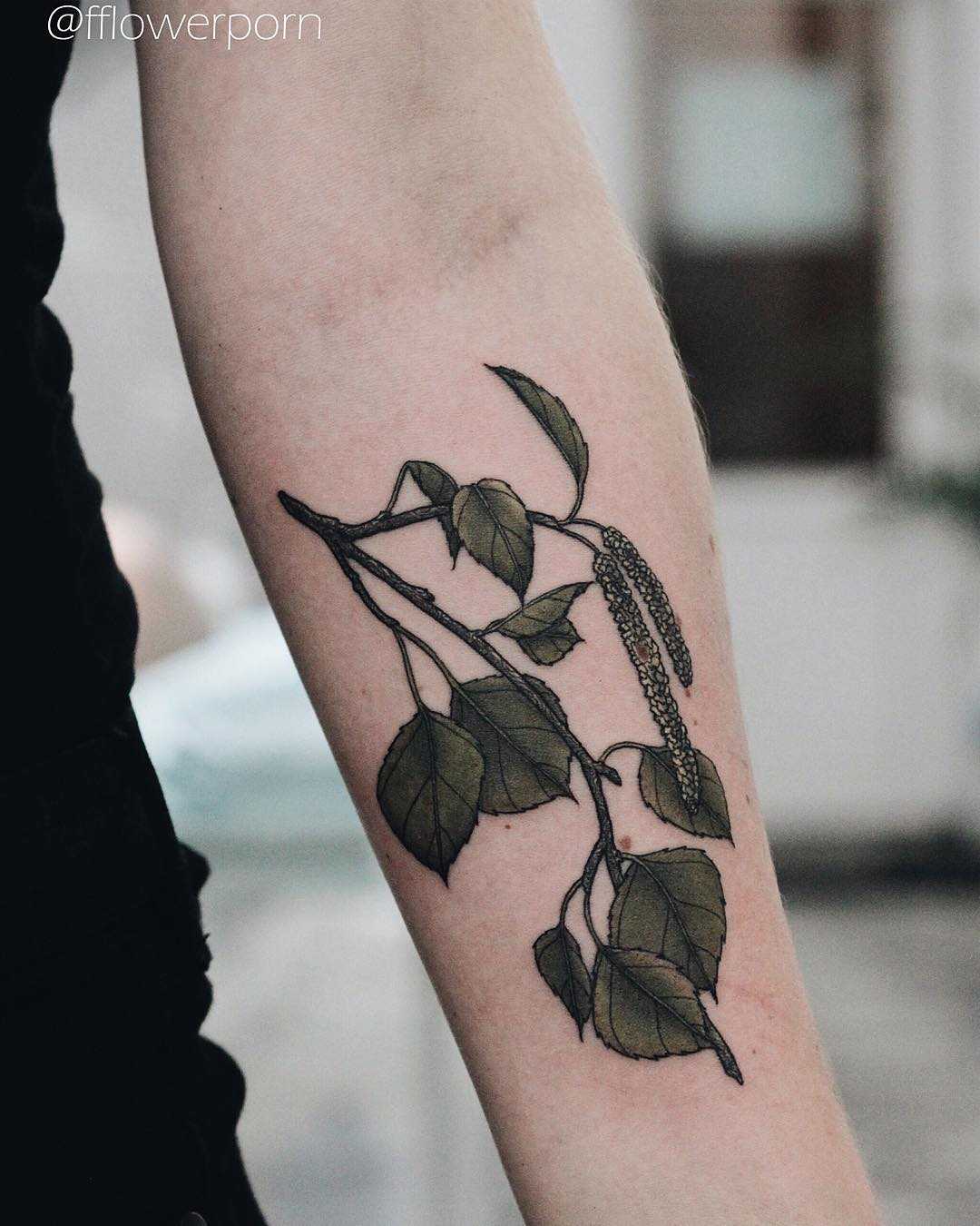 Birch branch tattoo on the forearm