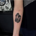 Black crystal tattoo by Pari Corbitt