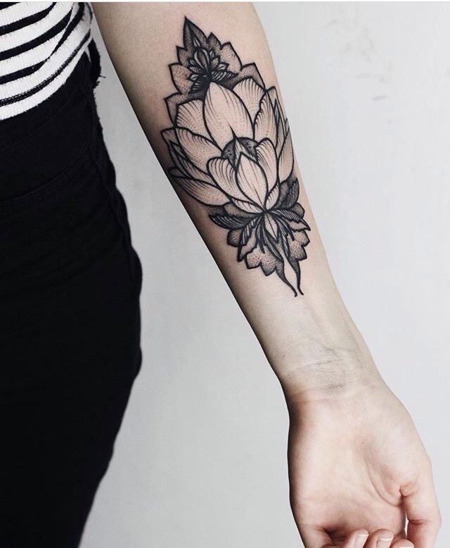 Black flower tattoo by Anna Enola