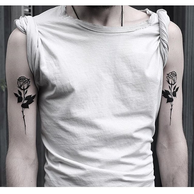 Black rose tattoos by Jonas Ribeiro