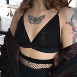 Blackwork butterfly on the chest