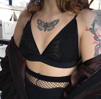Blackwork butterfly on the chest