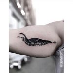 Blackwork slug tattoo