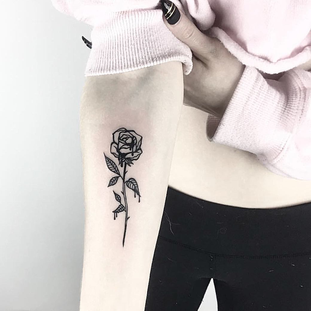 Bleeding rose tattoo