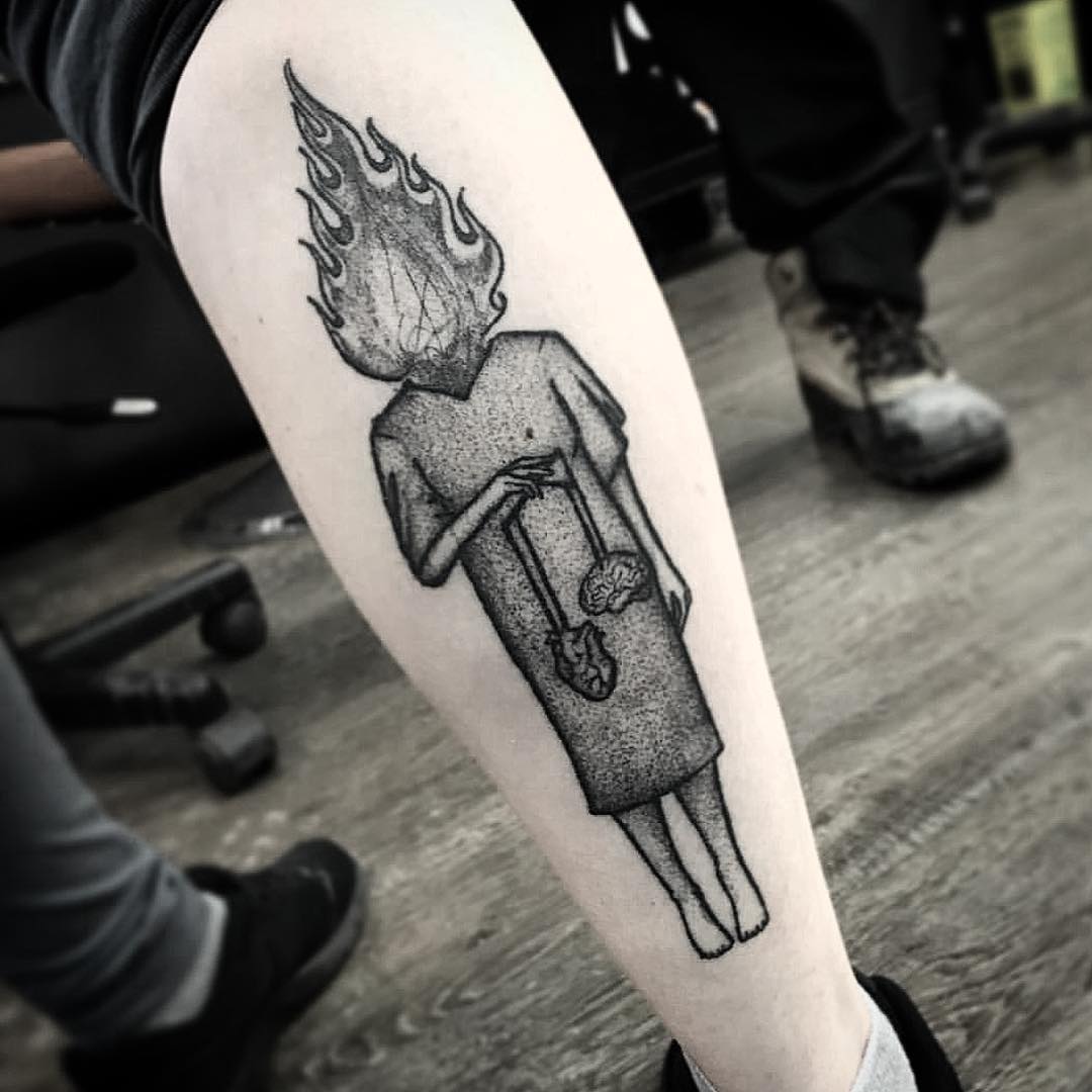 Burning head woman tattoo by Unkle Gregory