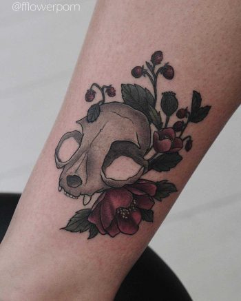Cat skull with asian poppies and wild strawberries tattoo