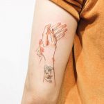 Clapping hands tattoo