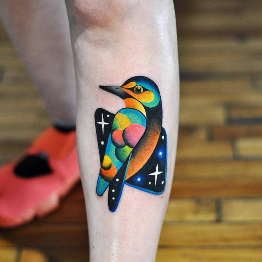 Cosmic bird tattoo by David Côté