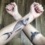 Fish and butterfly tattoos