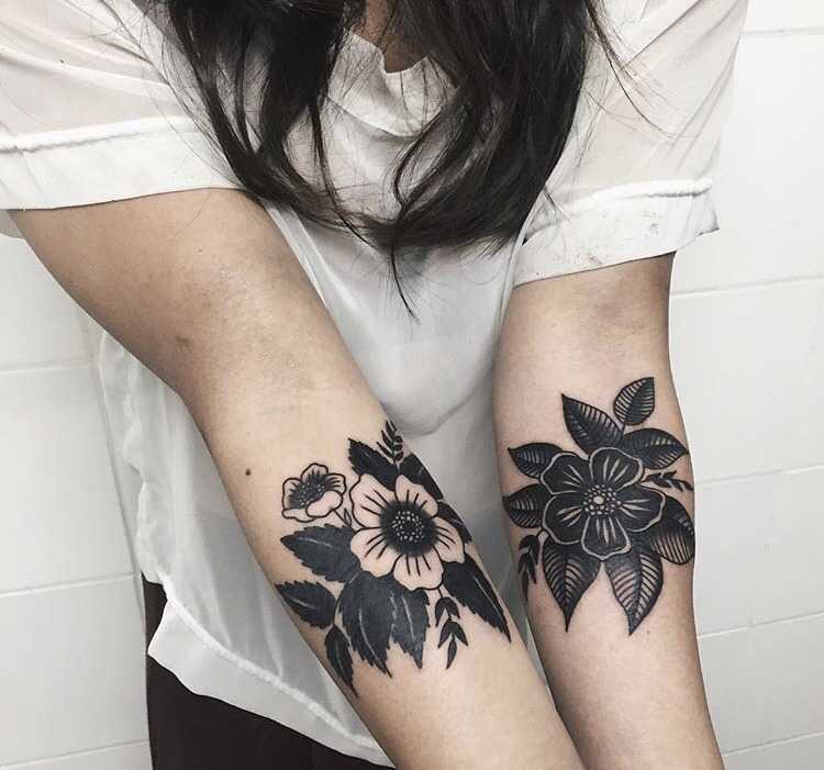 Flower tattoos by Antoine Larrey