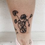 Flowers in a jug tattoo